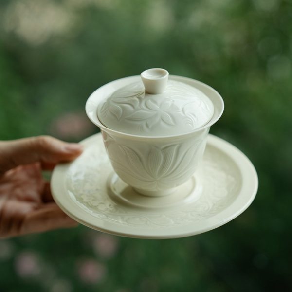 Mysterious gifts Ding Kiln Magnolia Pattern Ceramic Tea Cup with Saucer