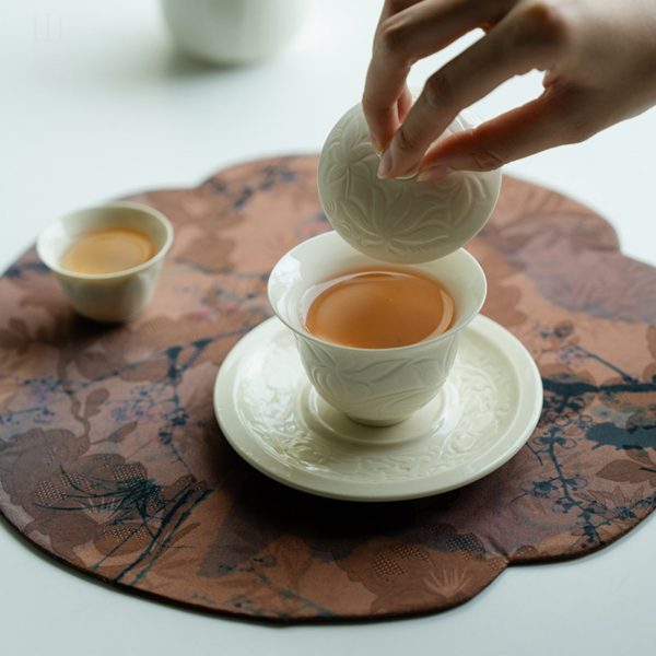 Mysterious gifts Ding Kiln Magnolia Pattern Ceramic Tea Cup with Saucer