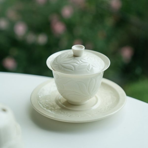 Mysterious gifts Ding Kiln Magnolia Pattern Ceramic Tea Cup with Saucer